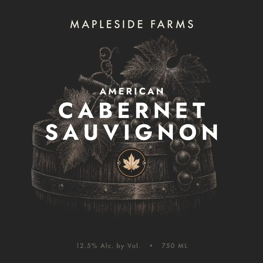 American Cabernet Sauvignon label: a cellar barrel wrapped in vines, engraved on near-black