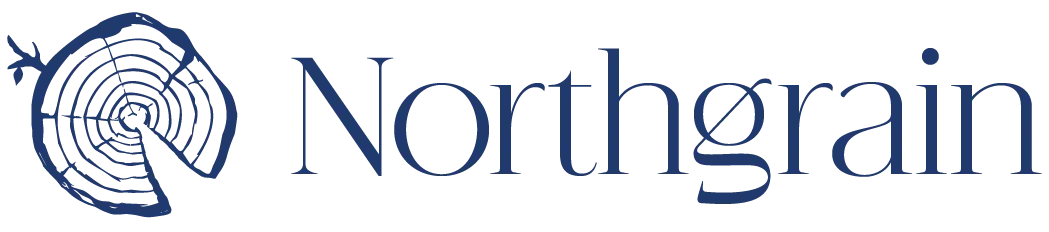 The chosen Northgrain logo: the end grain of a cut log beside a light serif wordmark
