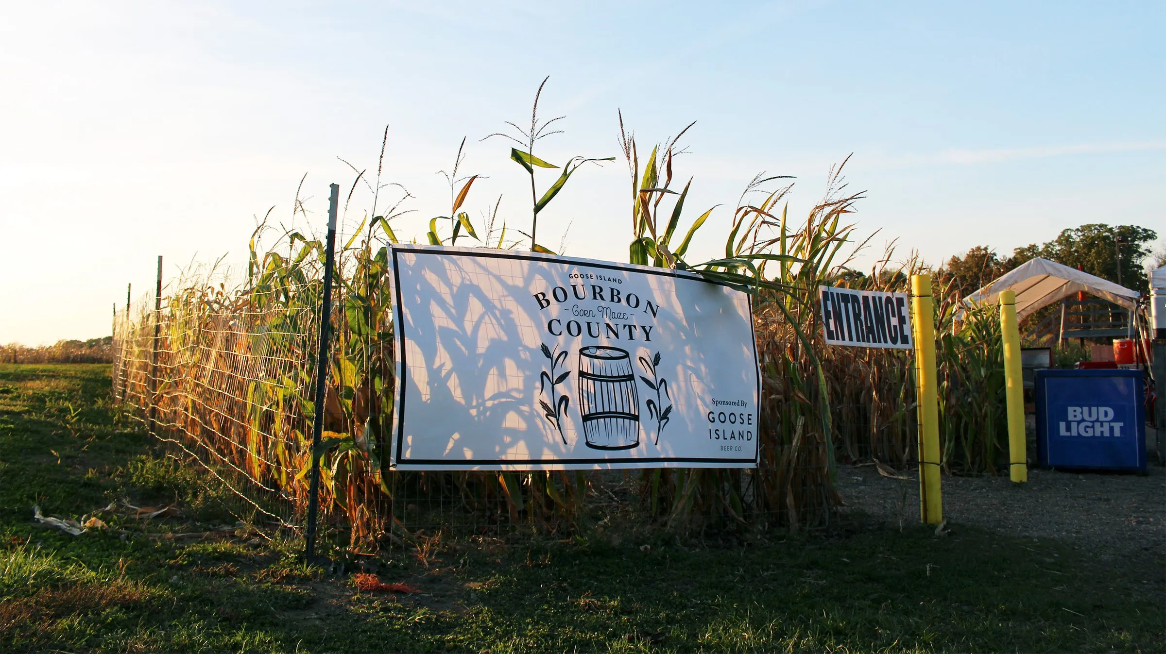 Brewery signs marking the entrance to the barrel-aged corn maze