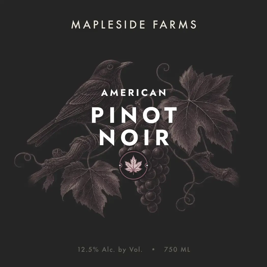 American Pinot Noir label: a songbird among vines and grape clusters, engraved on near-black