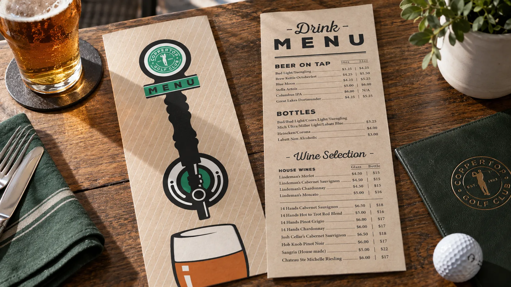 Coppertop drink menu on a pub table beside a beer and a golf ball